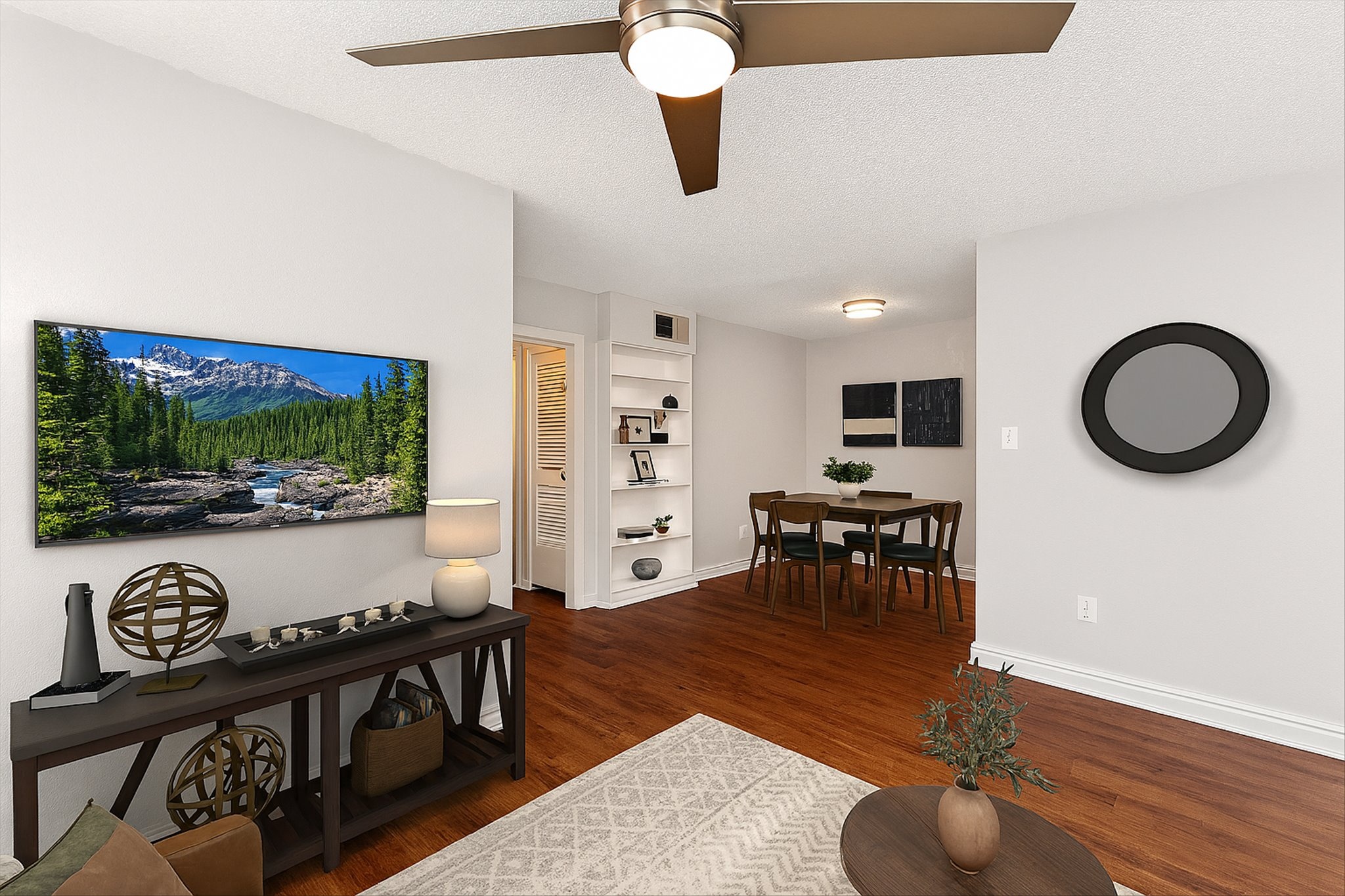 2401 Manor Road, Unit 120 Austin, TX 78722 - Photo 2 of 34 a living room with furniture and a flat screen tv