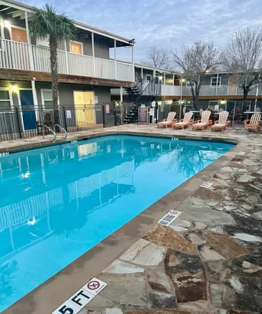 a view of a house with a swimming pool