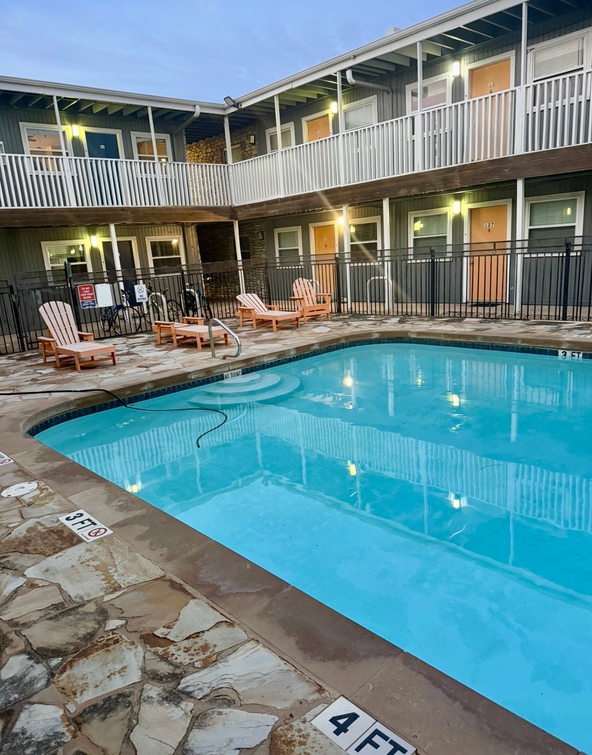 2401 Manor Road, Unit 120 Austin, TX 78722 - Photo 28 of 34 a view of a house with a swimming pool