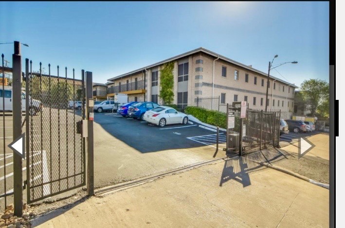 2401 Manor Road, Unit 120 Austin, TX 78722 - Photo 30 of 34 a view of a house with backyard