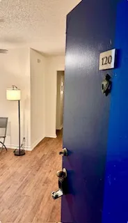 a view of empty room with a door