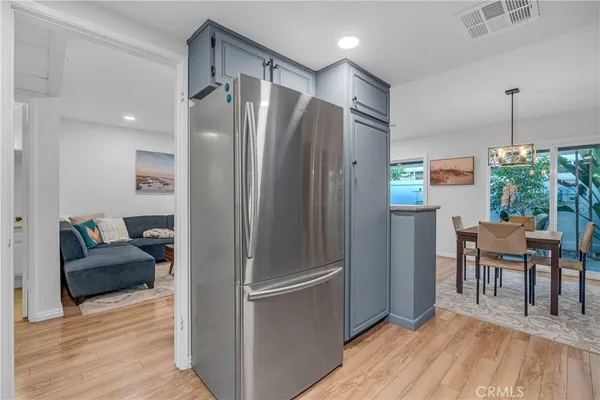 a bedroom with a bed and a table