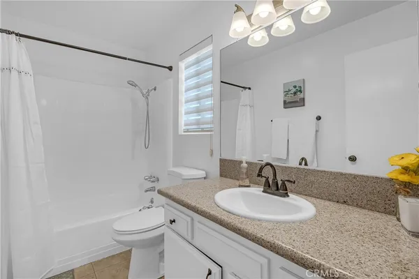a view of hallway with wooden floor