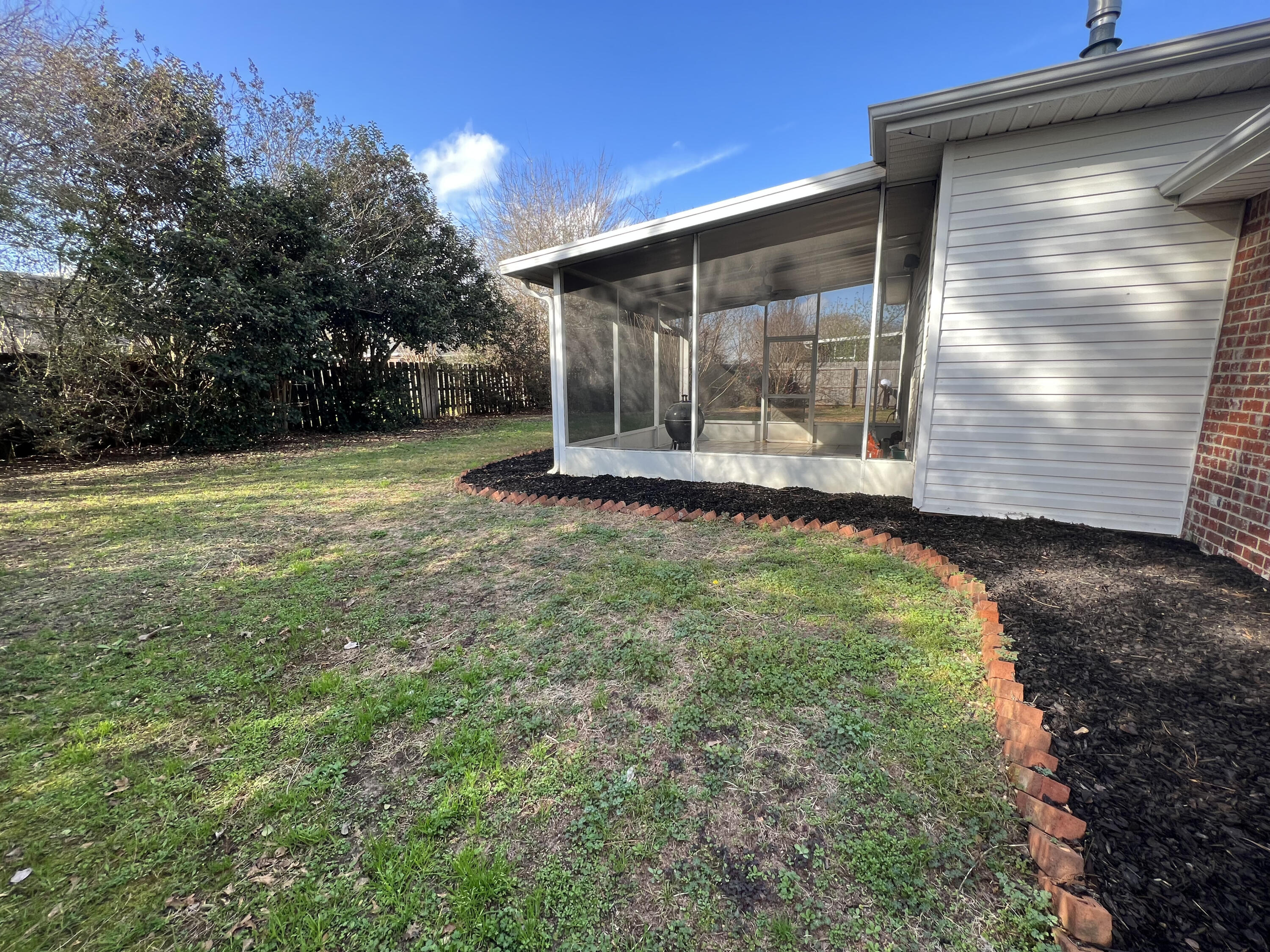 5633 North Brook Drive Crestview, FL 32539 - Photo 24 of 28 a view of a backyard of the house