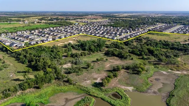 a view of city with ocean