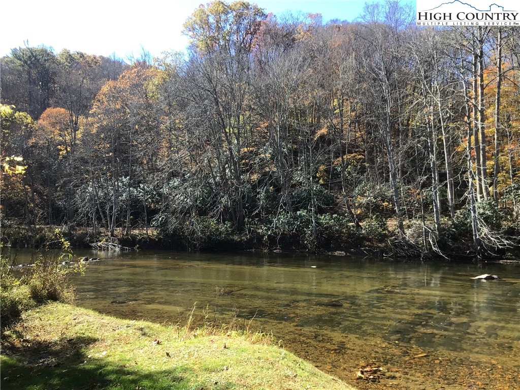 1459 River Front Ridge Drive Jefferson, NC 28640 - Photo 2 of 33 a view of a lake with houses