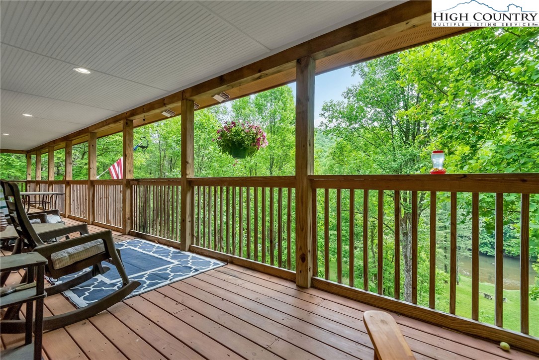 1459 River Front Ridge Drive Jefferson, NC 28640 - Photo 21 of 33 a view of a balcony with wooden floor