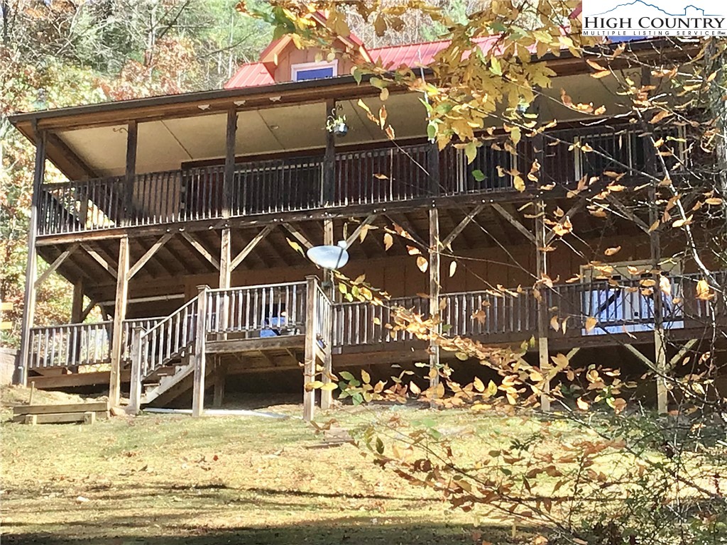 1459 River Front Ridge Drive Jefferson, NC 28640 - Photo 25 of 33 a view of a house with a wooden fence