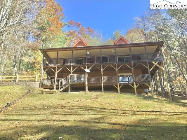 a view of a lake with a yard