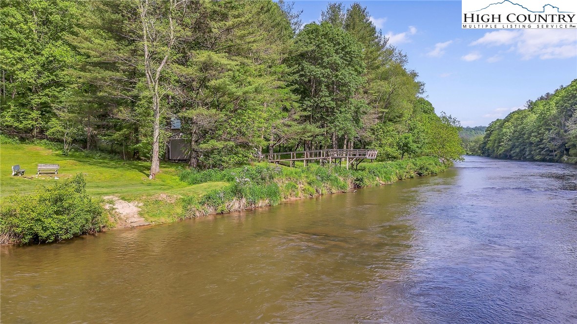 1459 River Front Ridge Drive Jefferson, NC 28640 - Photo 28 of 33 a view of a lake with a yard