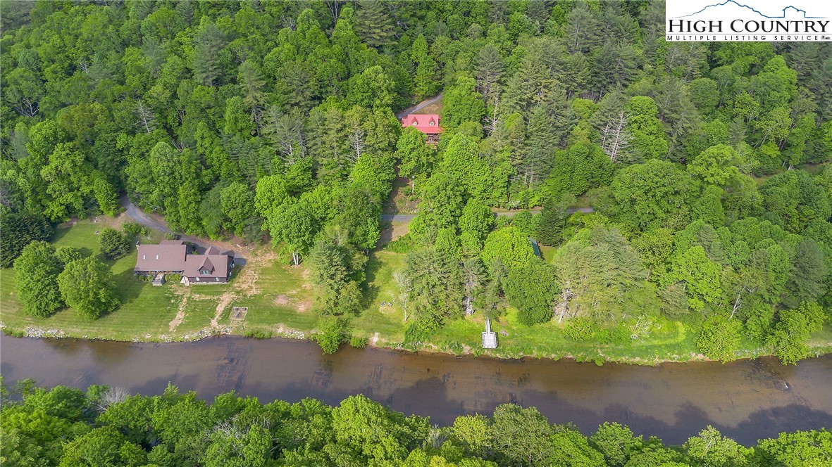 1459 River Front Ridge Drive Jefferson, NC 28640 - Photo 29 of 33 an aerial view of a house with a yard