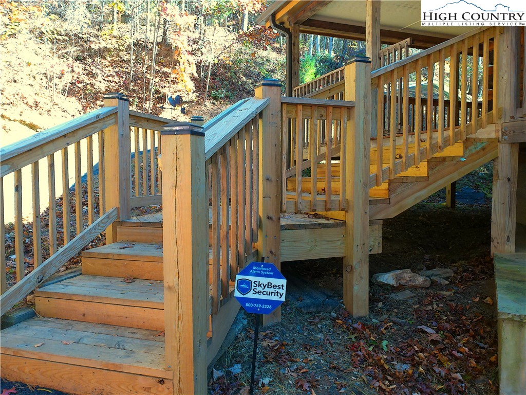 1459 River Front Ridge Drive Jefferson, NC 28640 - Photo 30 of 33 a view of a pathway of a house with a small yard