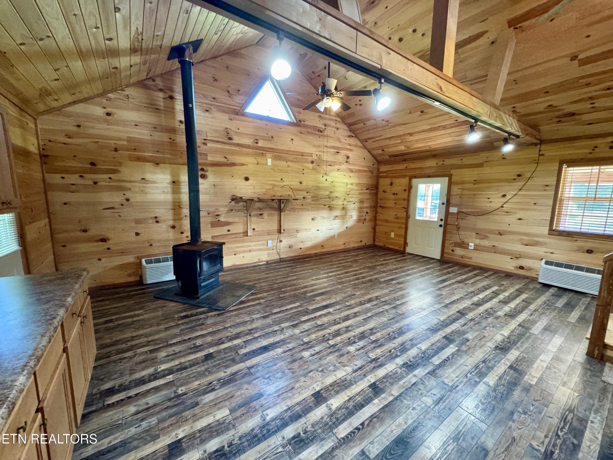 1336 Baldwin Gulf Road Clarkrange, TN 38553 - Photo 12 of 47 a view of an empty room with wooden floor