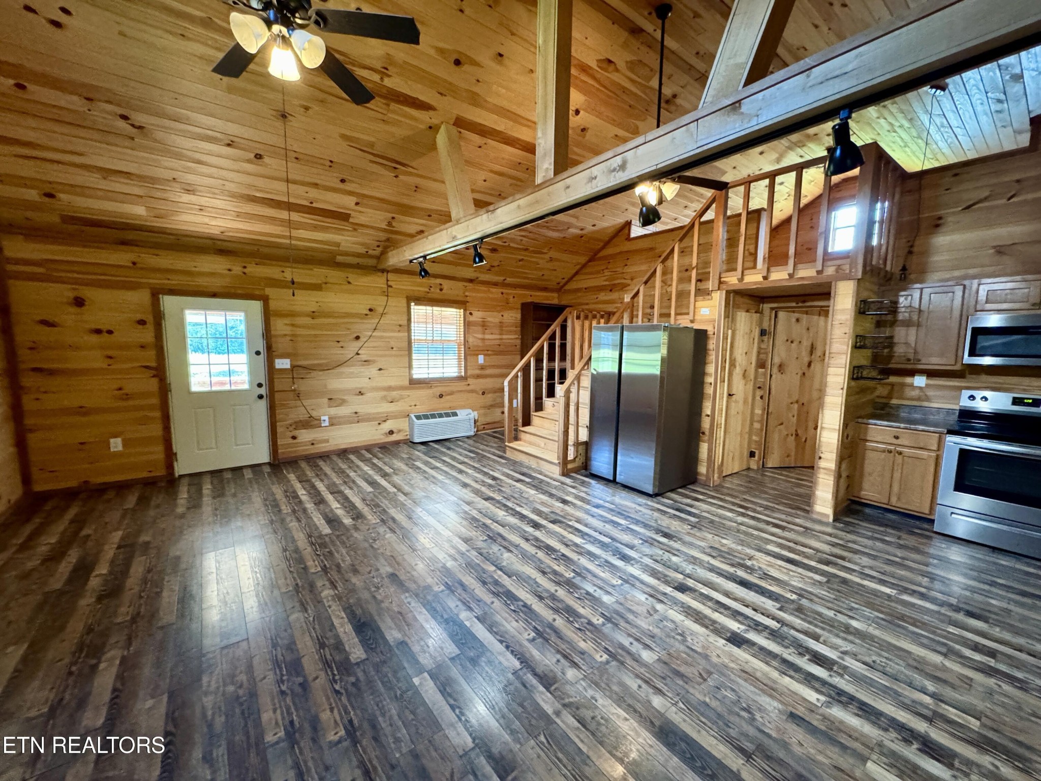 1336 Baldwin Gulf Road Clarkrange, TN 38553 - Photo 15 of 47 a view of a living room with wooden floor