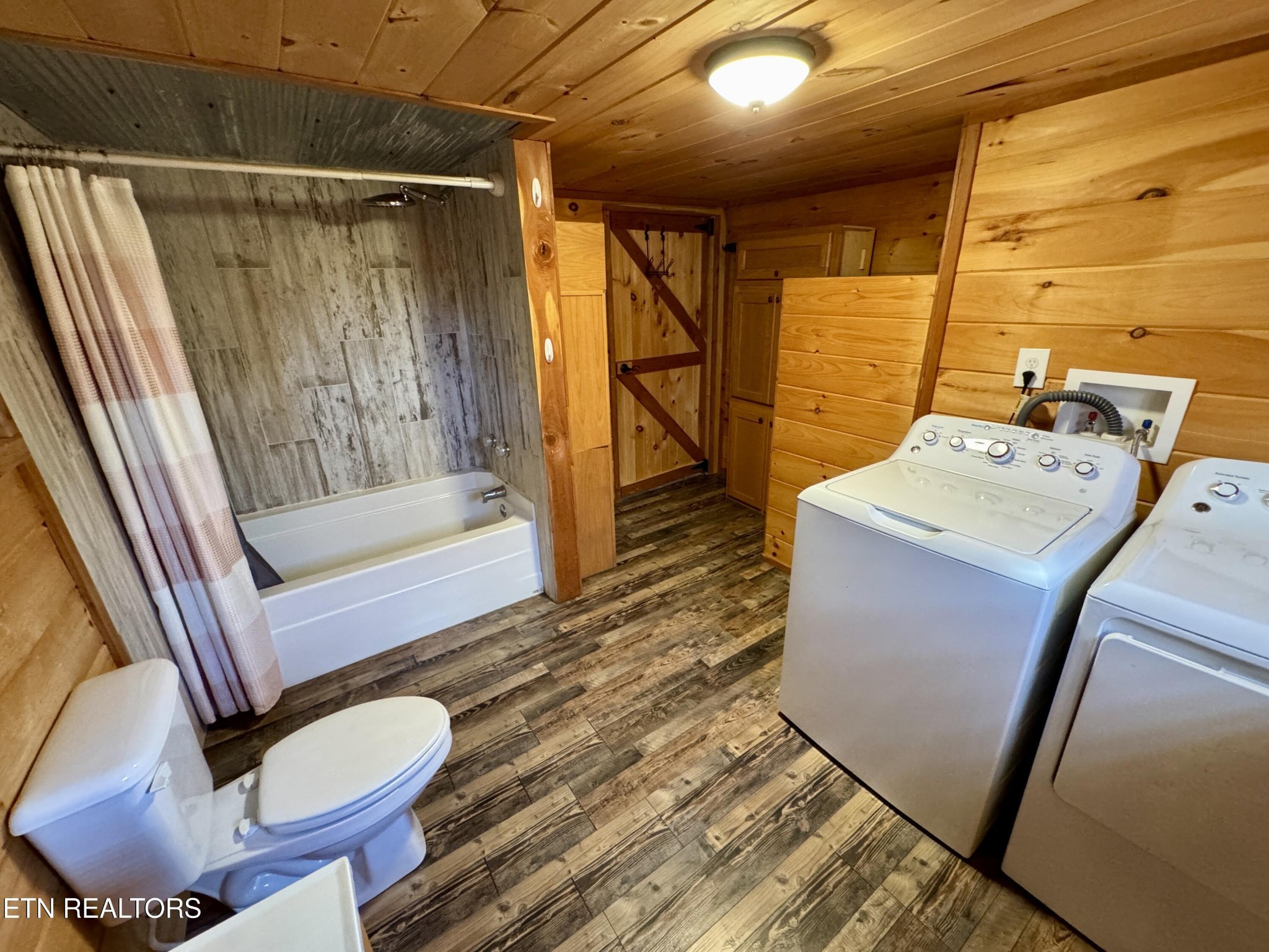 1336 Baldwin Gulf Road Clarkrange, TN 38553 - Photo 20 of 47 a bathroom with a sink toilet and shower
