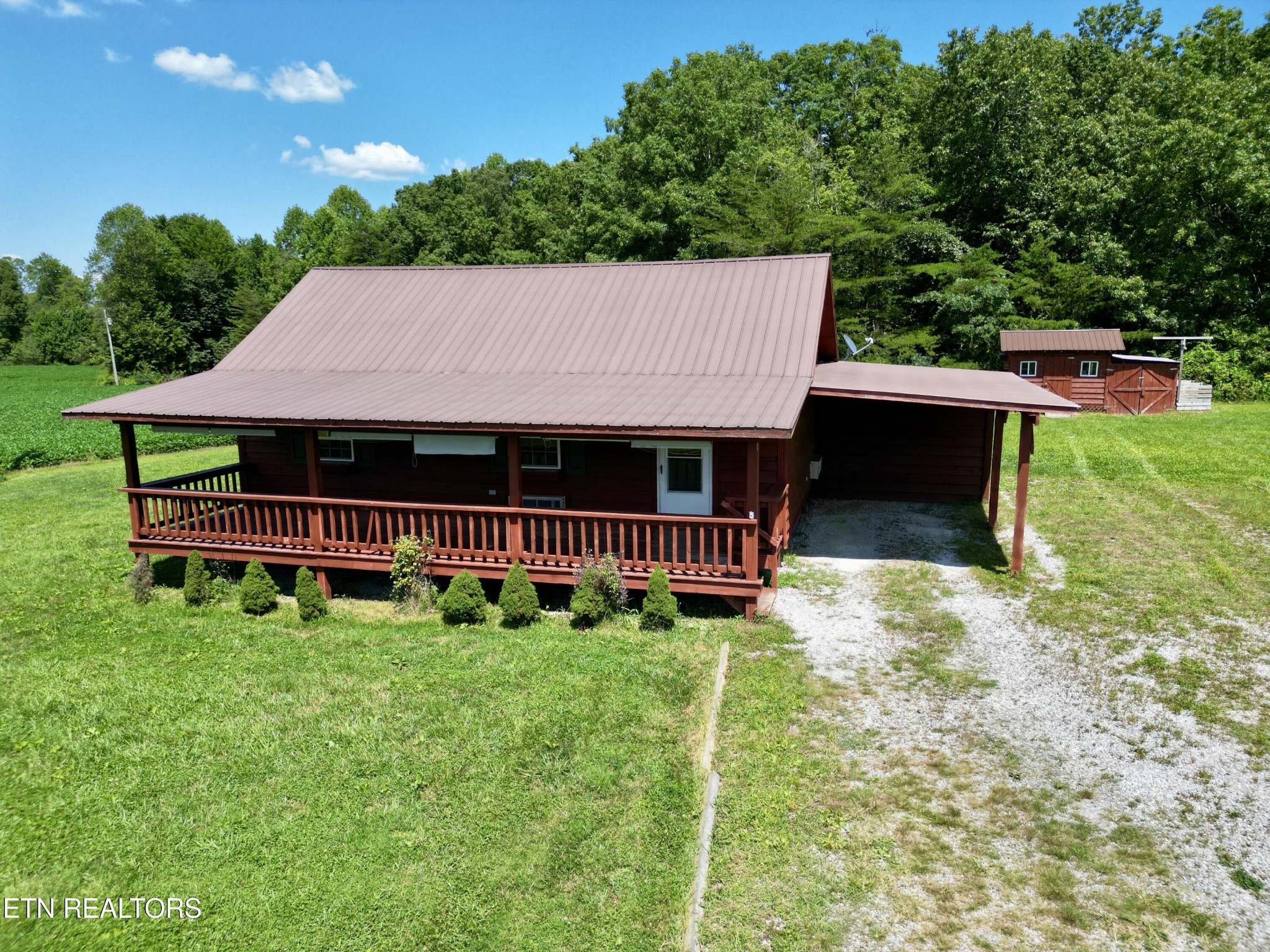 1336 Baldwin Gulf Road Clarkrange, TN 38553 - Photo 2 of 47 a view of a house with a yard and sitting area