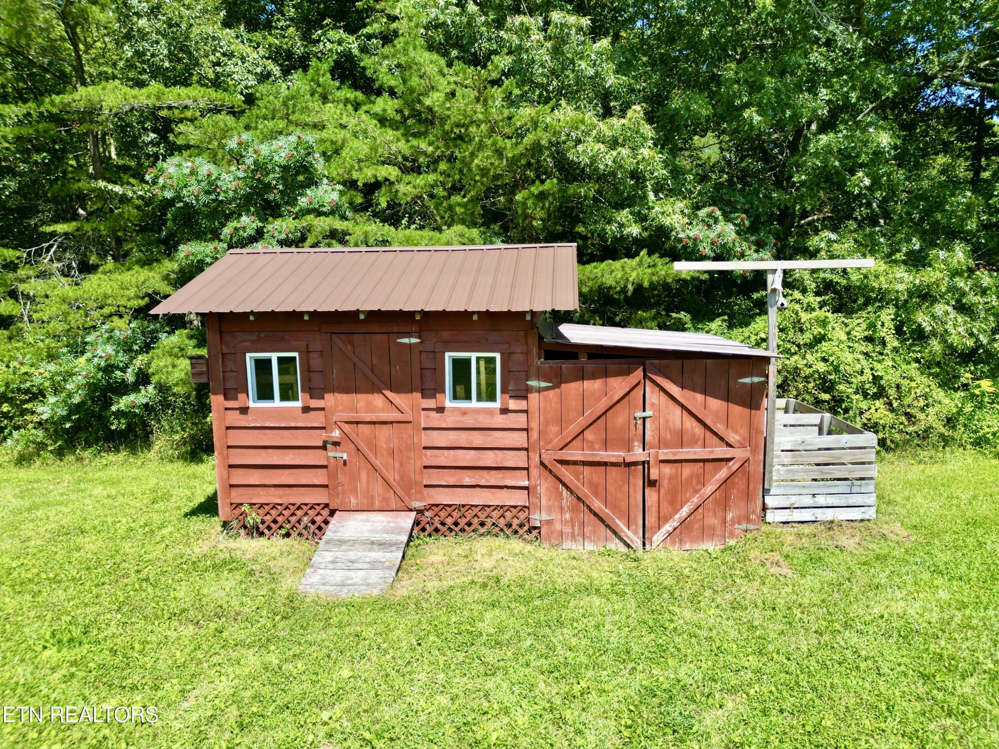 1336 Baldwin Gulf Road Clarkrange, TN 38553 - Photo 34 of 47 front view of a house with a yard