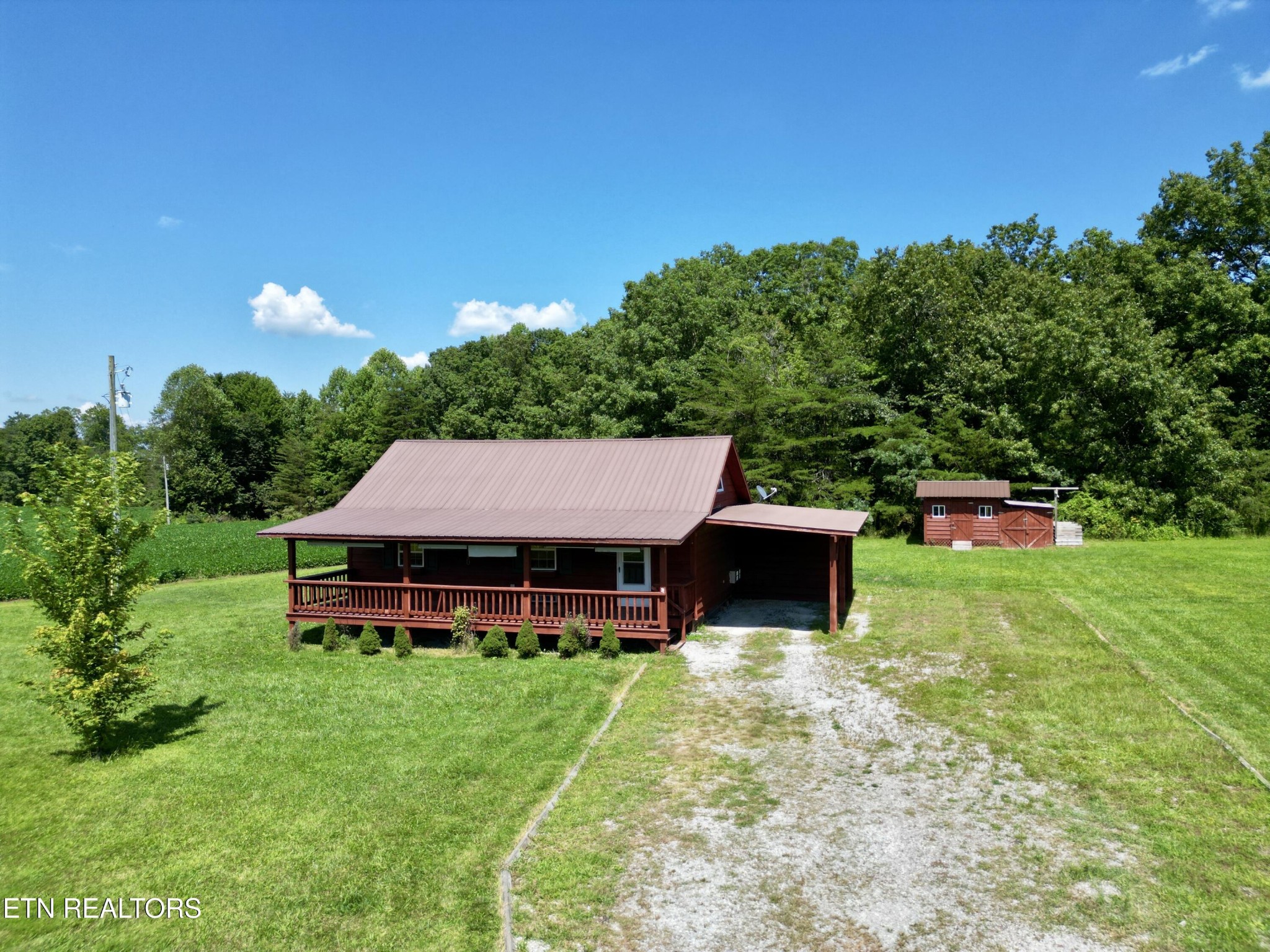 1336 Baldwin Gulf Road Clarkrange, TN 38553 - Photo 35 of 47 a view of a house with a backyard