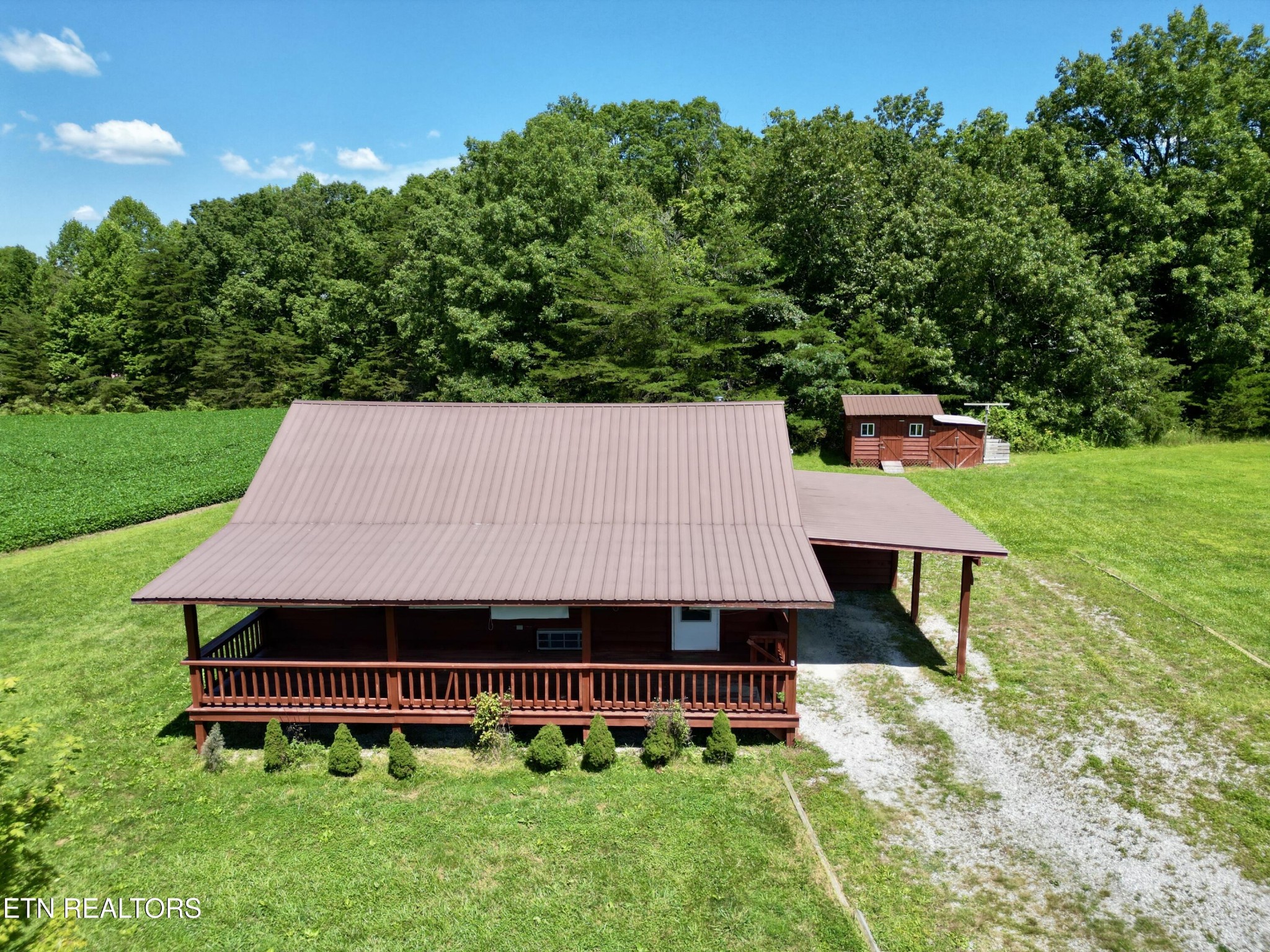 1336 Baldwin Gulf Road Clarkrange, TN 38553 - Photo 36 of 47 a view of a house with a yard and sitting area