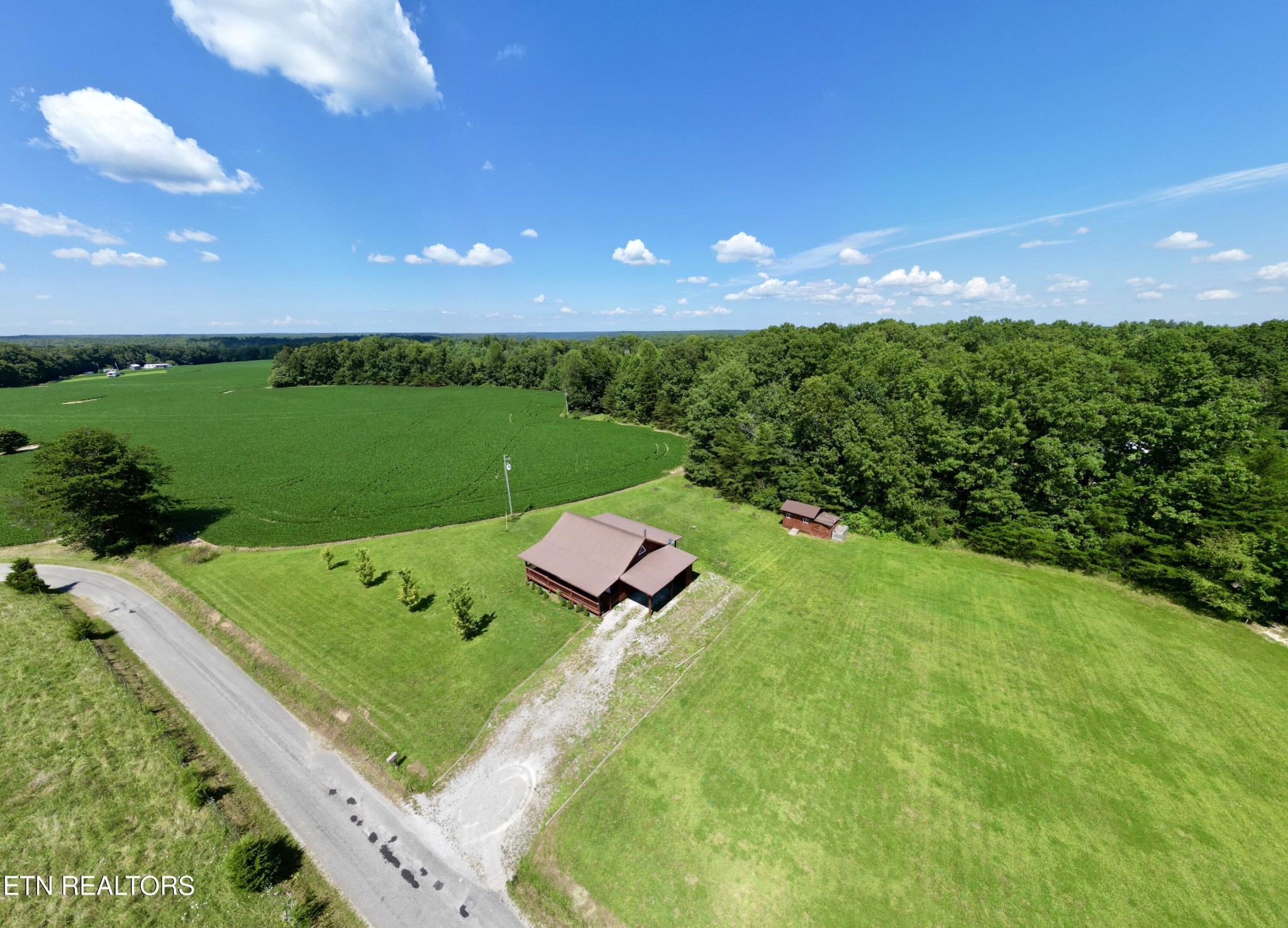 1336 Baldwin Gulf Road Clarkrange, TN 38553 - Photo 46 of 47 a view of a swimming pool and a yard