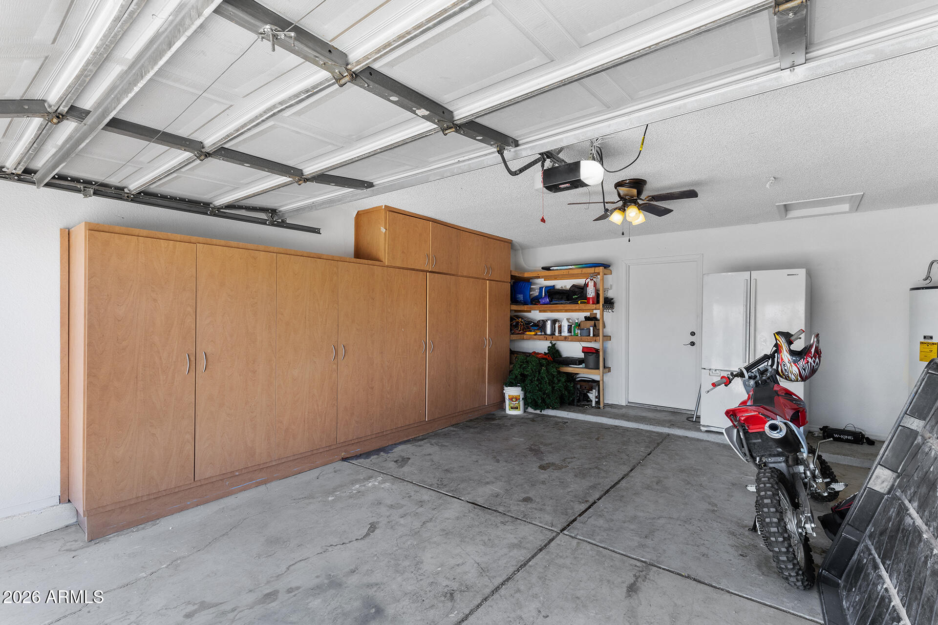 9002 West Coronado Road Phoenix, AZ 85037 - Photo 10 of 54 a view of a garage with storage