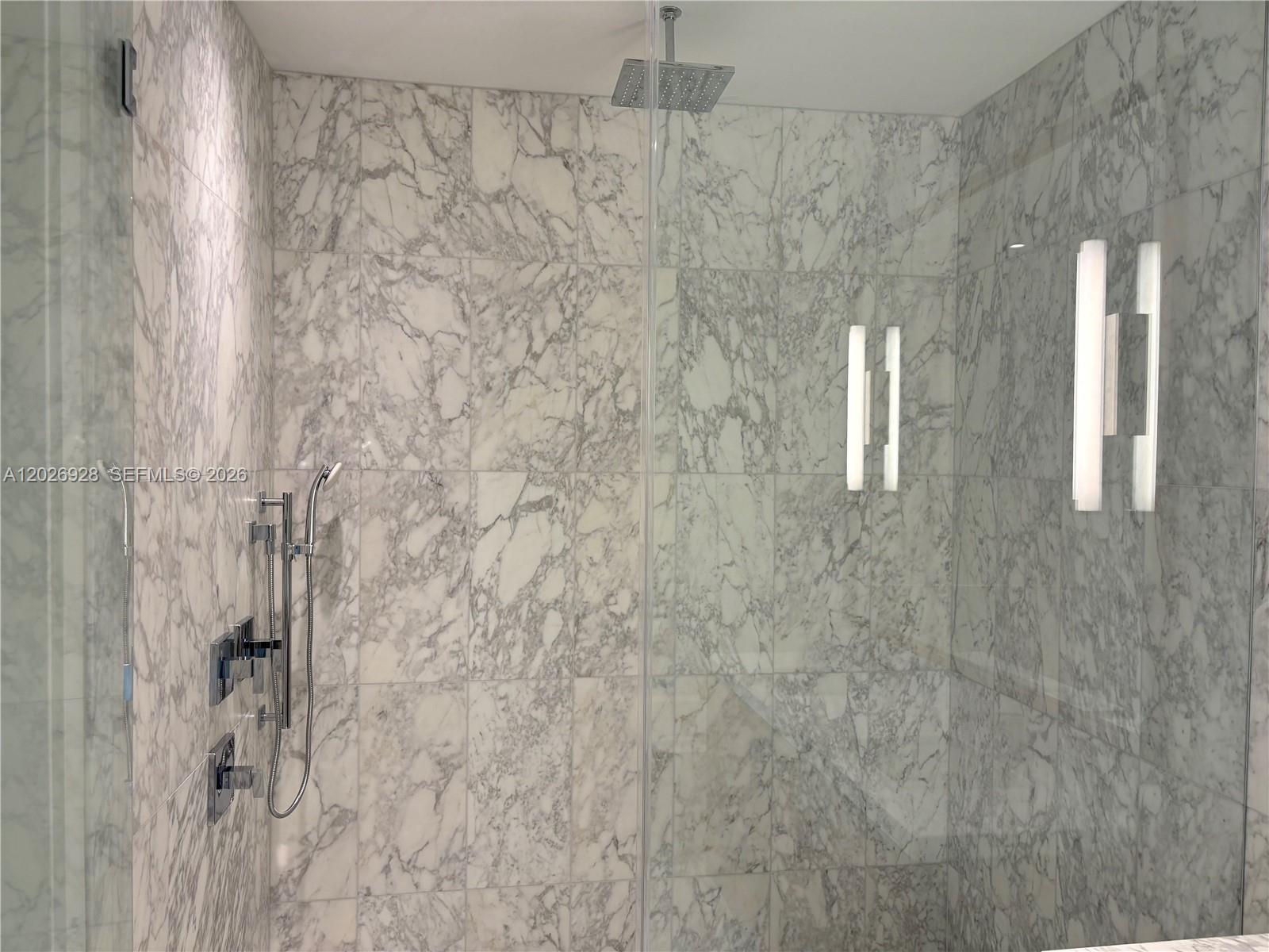 175 Southeast 25th Road, Unit 901 Miami, FL 33129 - Photo 11 of 18 a bathroom with a shower