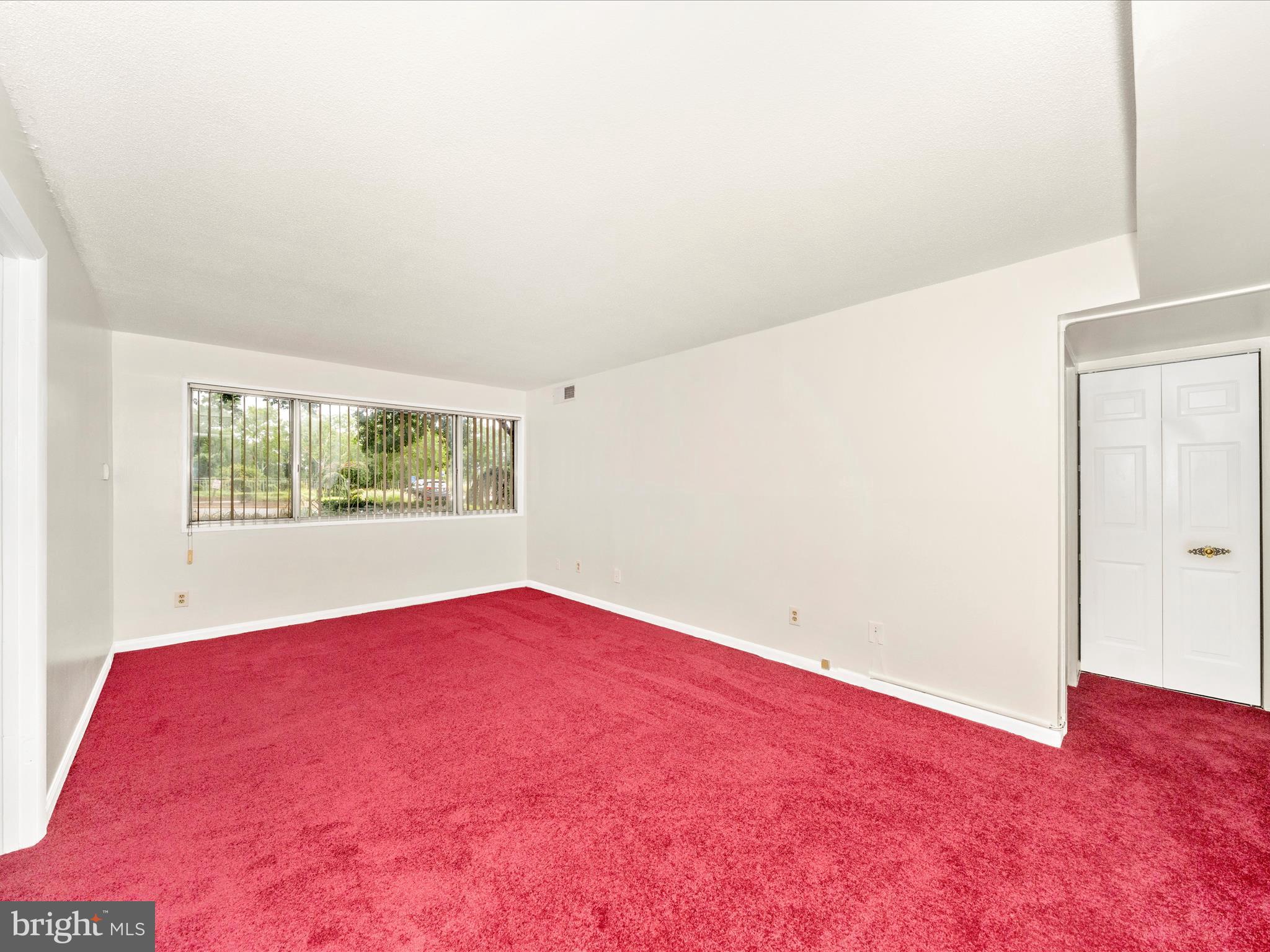 1836 Metzerott Road, Unit 106 Hyattsville, MD 20783 - Photo 16 of 54 an empty room with a window