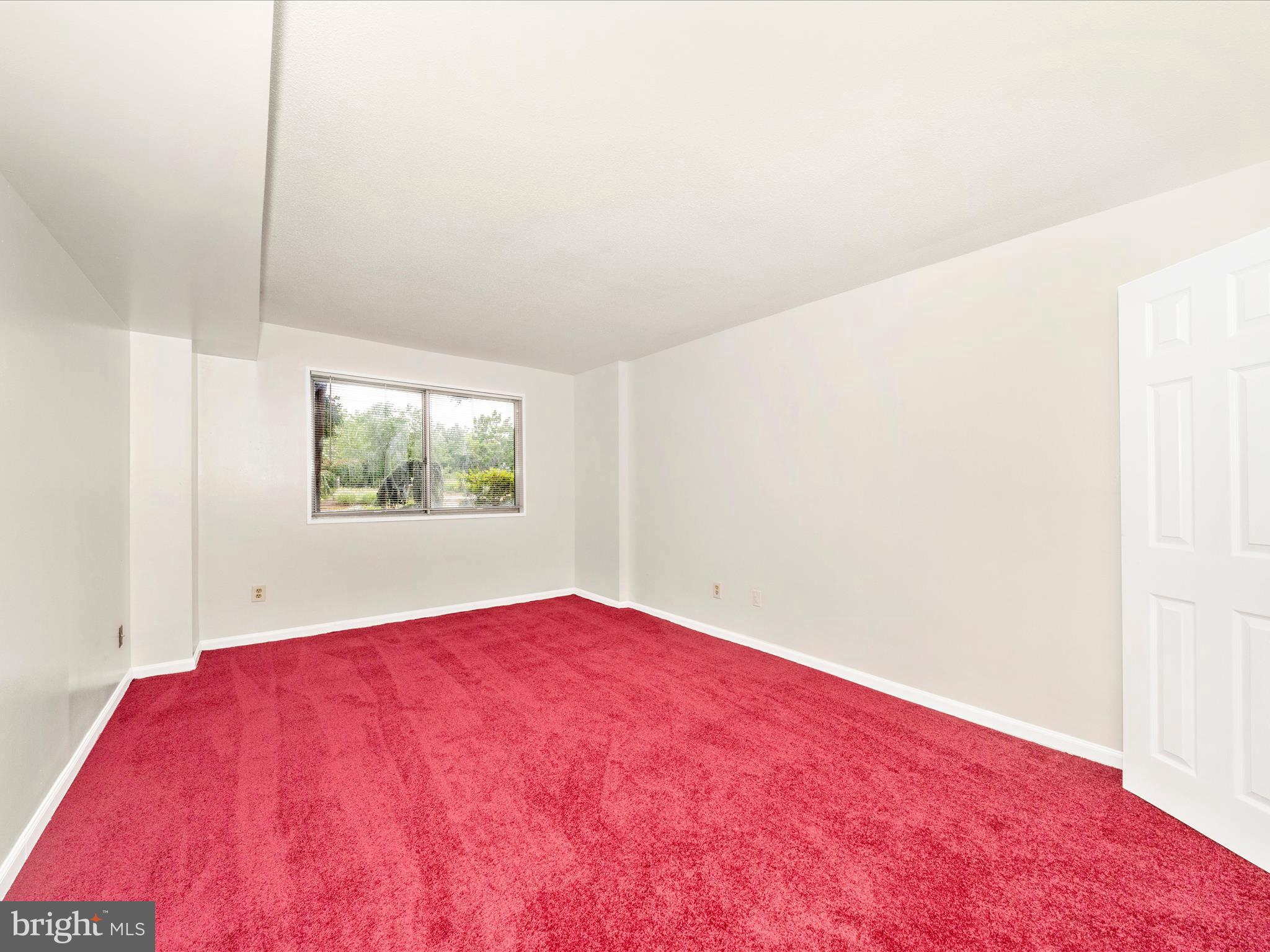 1836 Metzerott Road, Unit 106 Hyattsville, MD 20783 - Photo 23 of 54 a view of an empty room with a window