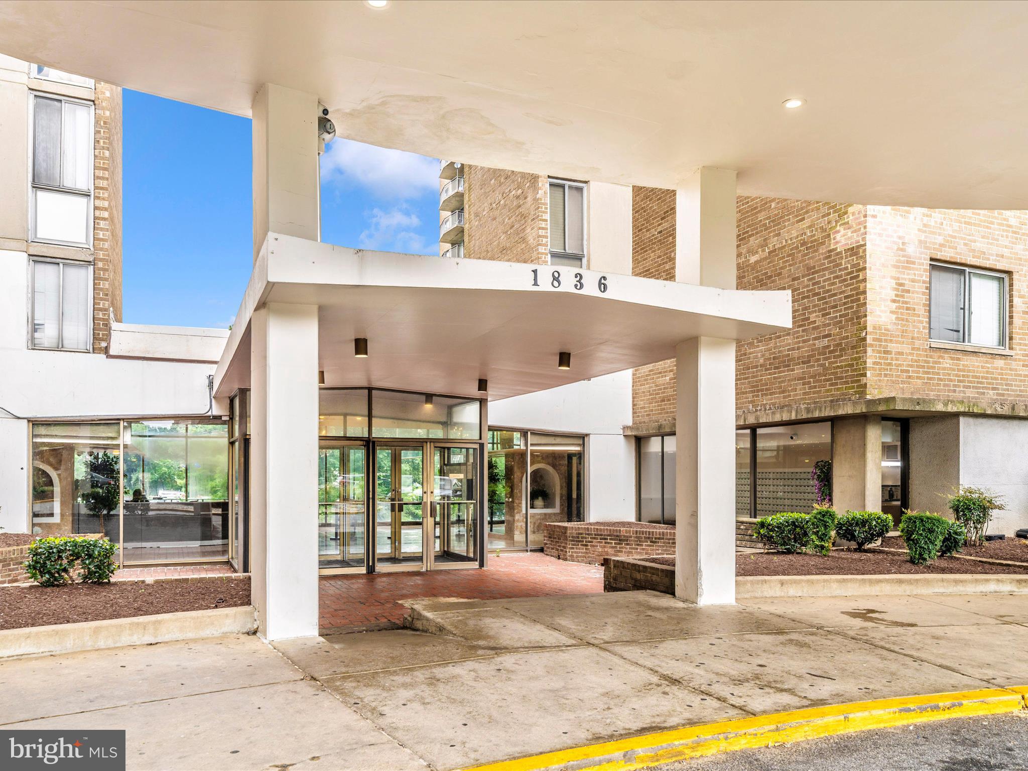 1836 Metzerott Road, Unit 106 Hyattsville, MD 20783 - Photo 6 of 54 a view of a building with a outdoor space