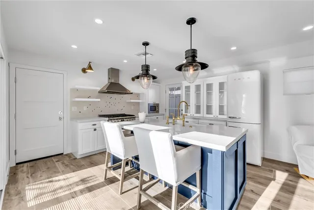 a very nice looking dining room with a table and chairs