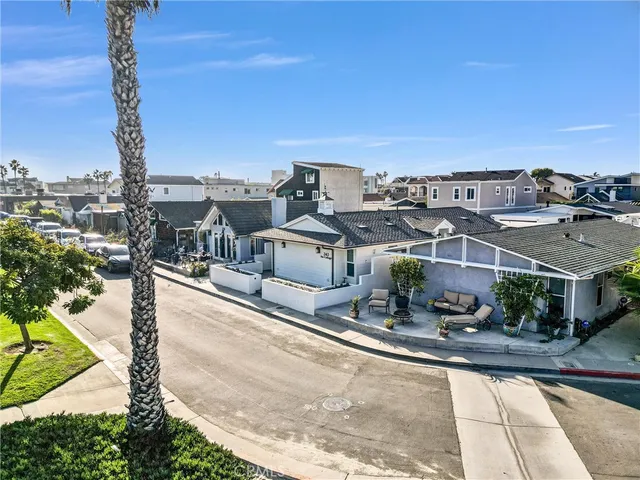 an aerial view of residential building and ocean