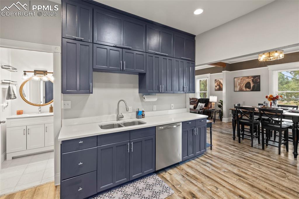 1904 Sheldon Avenue Colorado Springs, CO 80904 - Photo 15 of 40 a kitchen with a sink cabinets and wooden floor
