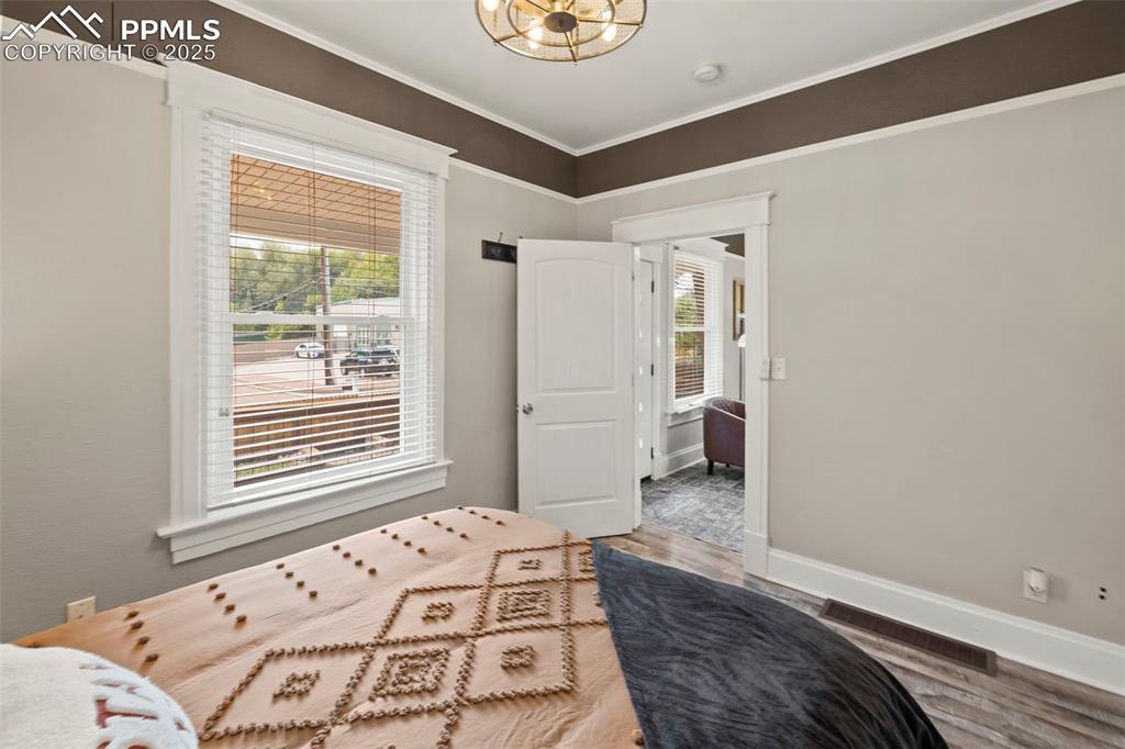 1904 Sheldon Avenue Colorado Springs, CO 80904 - Photo 18 of 40 a bedroom with a bed and a window