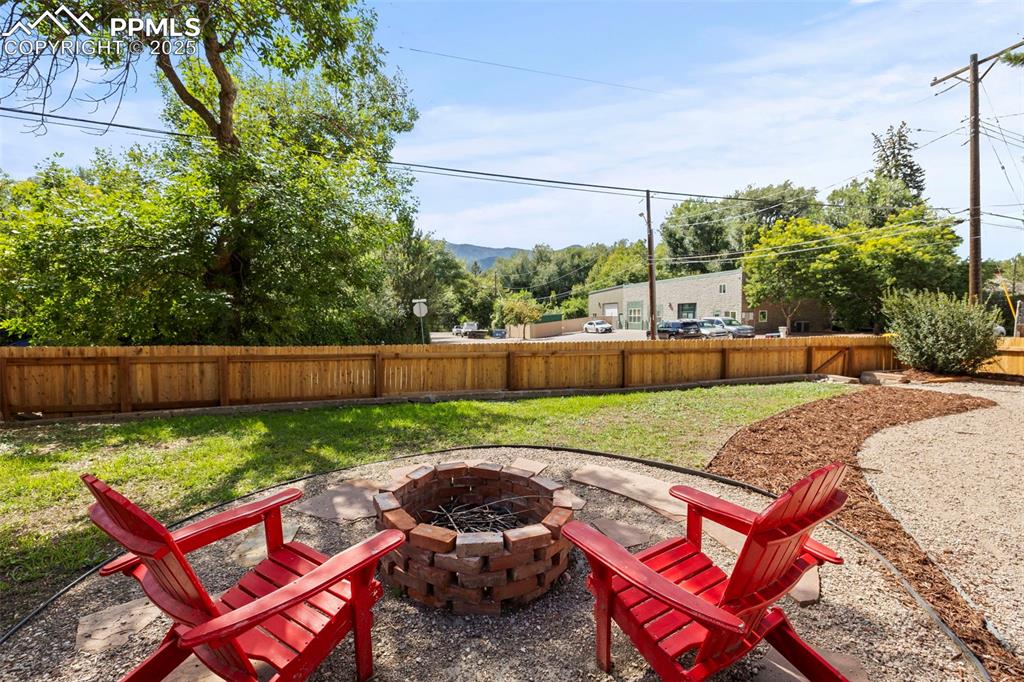 1904 Sheldon Avenue Colorado Springs, CO 80904 - Photo 27 of 40 a view of backyard with seating space and trees