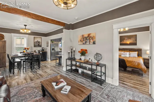 a living room with furniture and a table