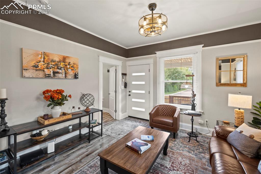 1904 Sheldon Avenue Colorado Springs, CO 80904 - Photo 6 of 40 a living room with furniture and a window