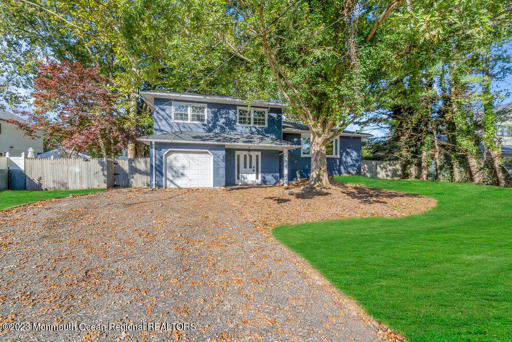 111 Sun Valley Road Toms River, NJ 08755 - Photo 2 of 51 a house view with a garden space