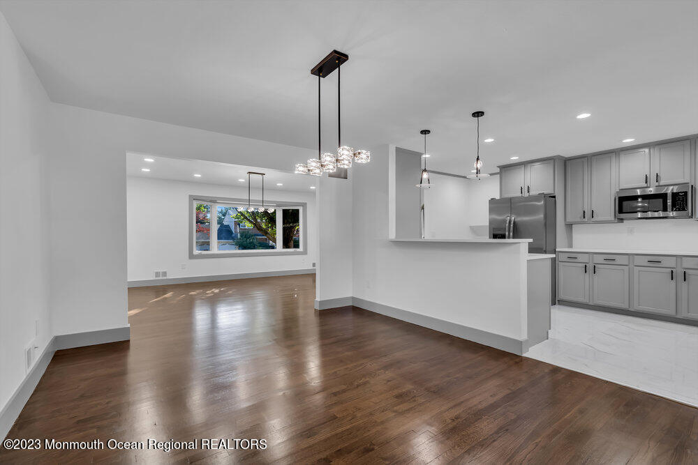 111 Sun Valley Road Toms River, NJ 08755 - Photo 31 of 51 a view of a kitchen with a sink wooden floor and a kitchen view
