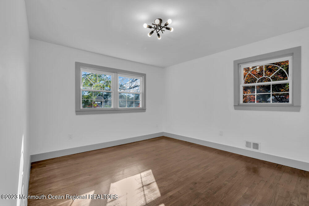 111 Sun Valley Road Toms River, NJ 08755 - Photo 40 of 51 a view of an empty room with a window