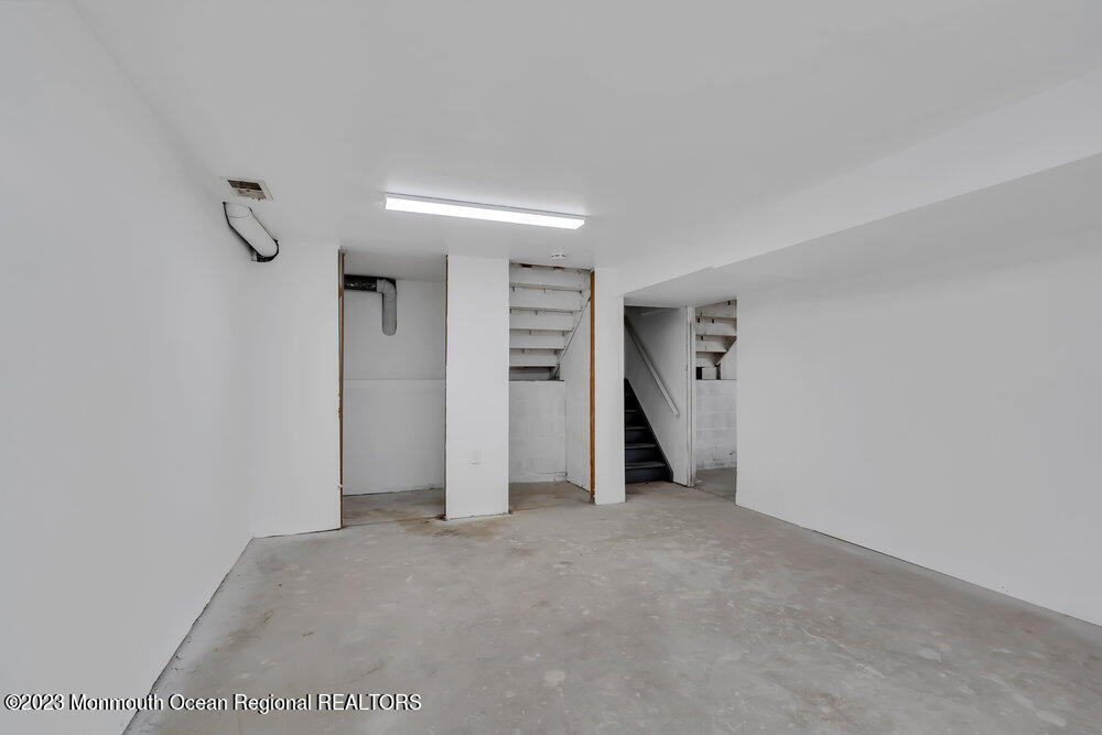 111 Sun Valley Road Toms River, NJ 08755 - Photo 47 of 51 a view of an empty room with a window