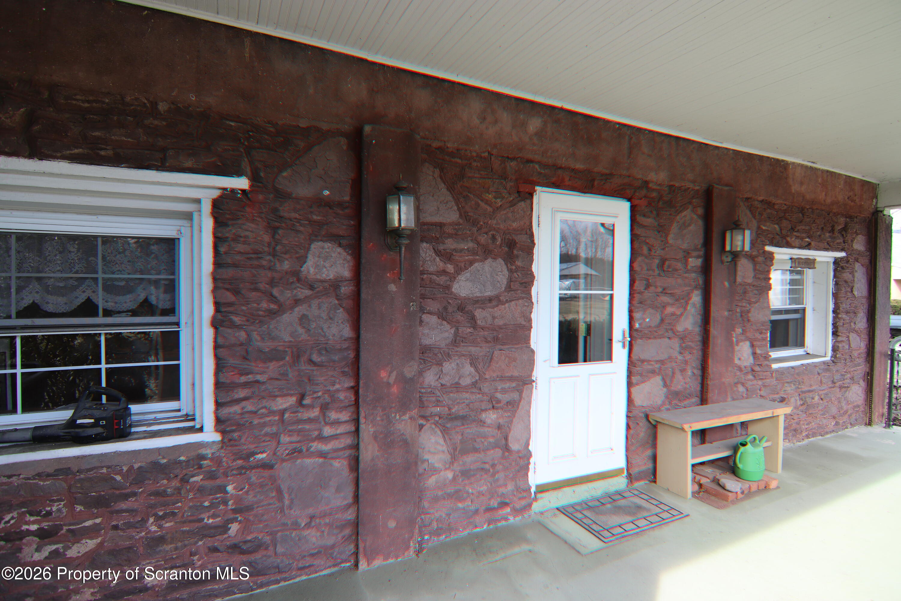 502 State Rte 92 South Tunkhannock, PA 18657 - Photo 3 of 52 a front view of a house with a yard