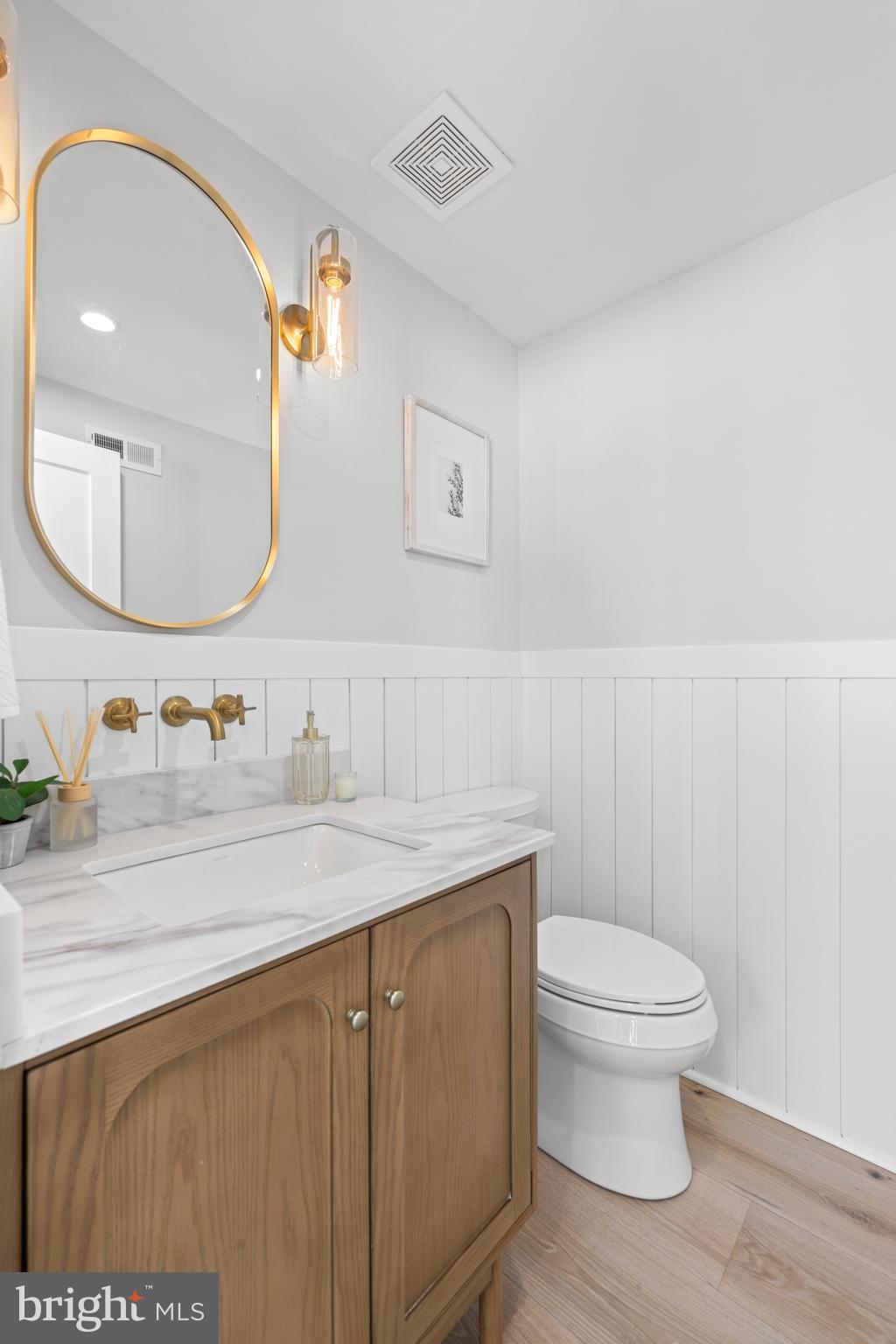 2577 Wayland Road Berwyn, PA 19312 - Photo 32 of 79 Main Floor Half Bathroom with Shiplap Accents