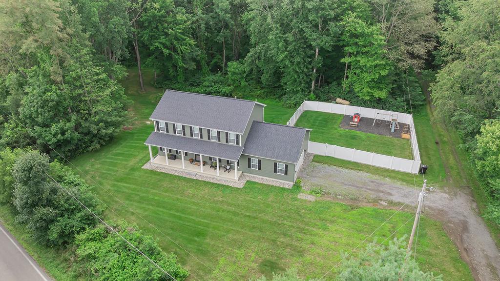 274 Elmbrook Road Beaver Falls, PA 15010 - Photo 46 of 50 Great view of home, yard and fenced in recreation area. Property extends into the woods behind home.