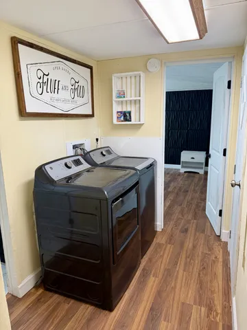 a utility room with washer and dryer