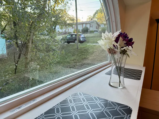 a view of a balcony with chair