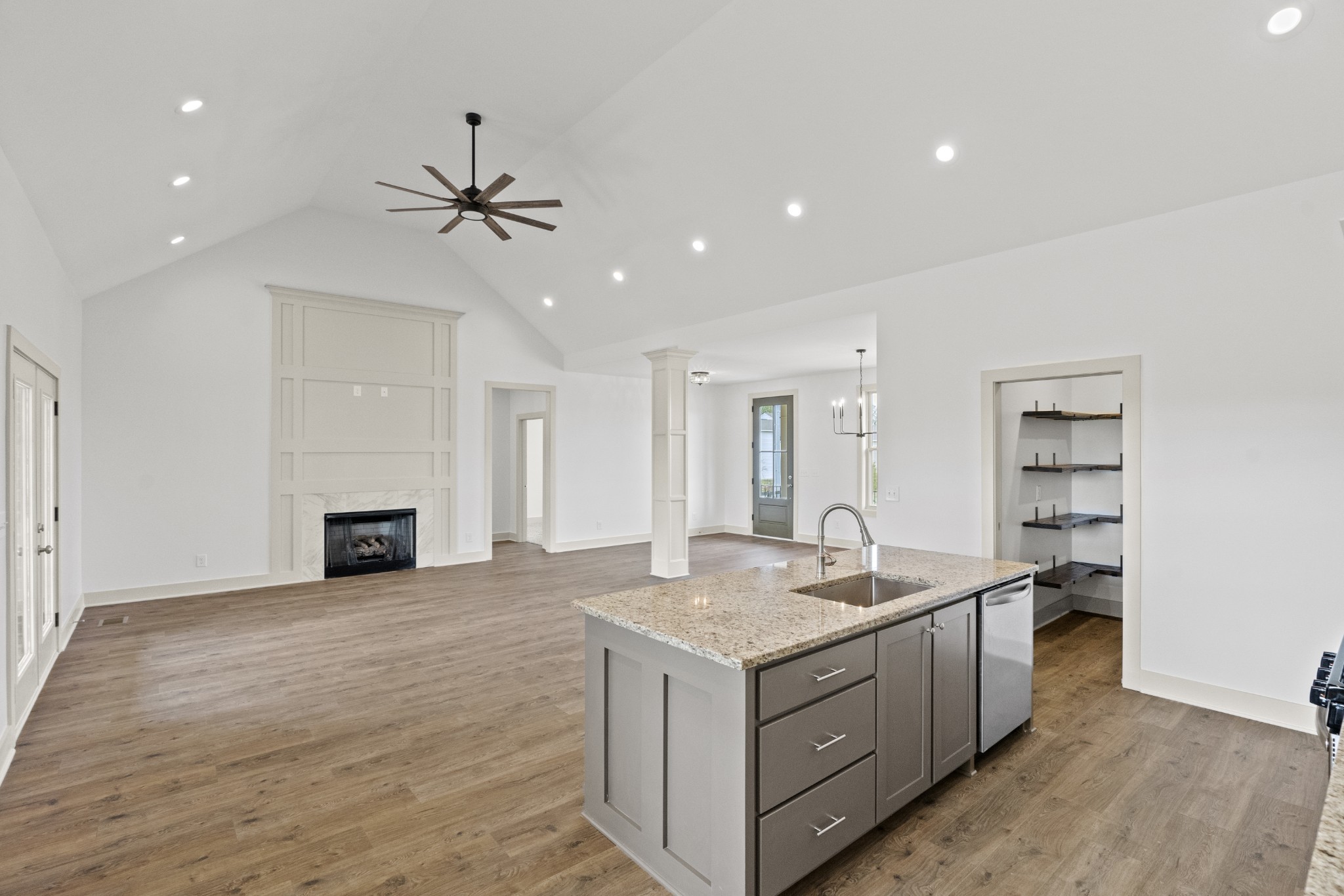 3390 Calista Road White House, TN 37188 - Photo 11 of 25 a kitchen with sink cabinets and wooden floor
