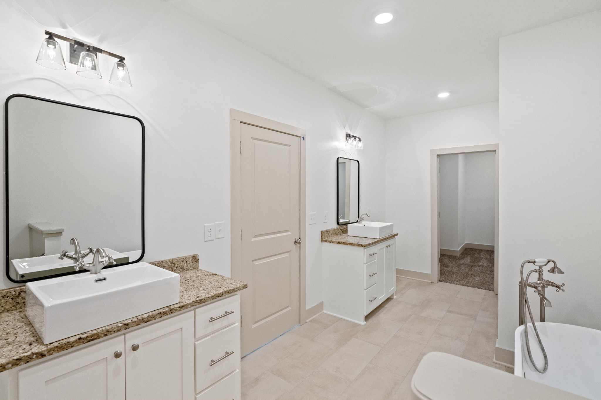 3390 Calista Road White House, TN 37188 - Photo 14 of 25 a bathroom with a granite countertop sink and a mirror