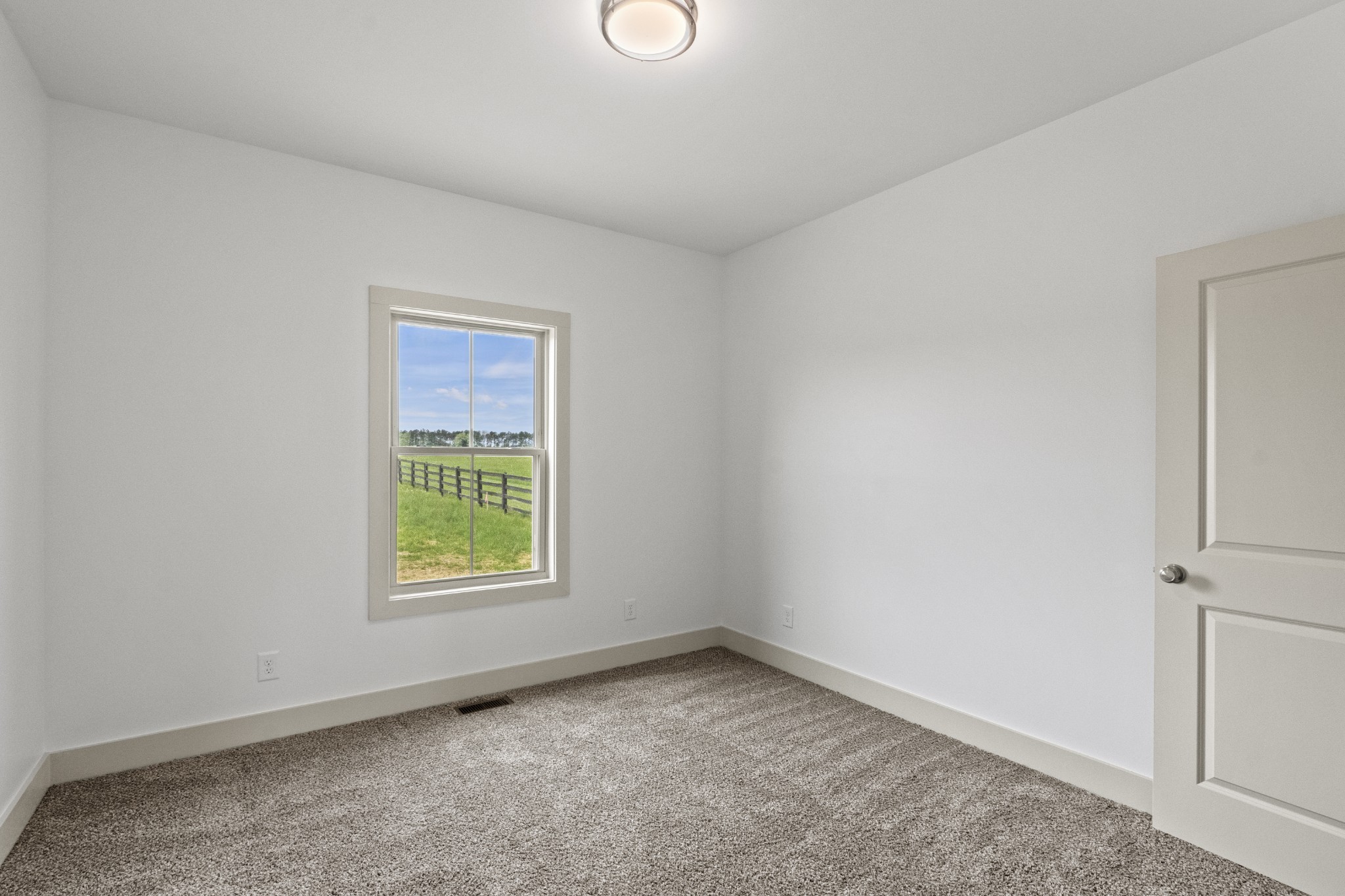 3390 Calista Road White House, TN 37188 - Photo 18 of 25 an empty room with a window
