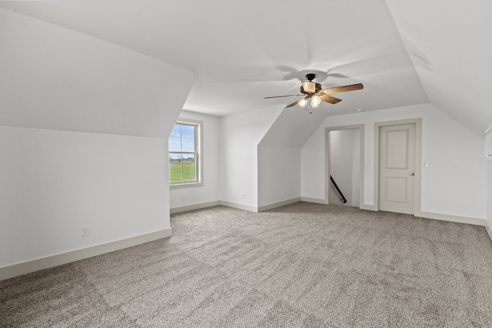3390 Calista Road White House, TN 37188 - Photo 21 of 25 wooden floor in an empty room with a ceiling fan
