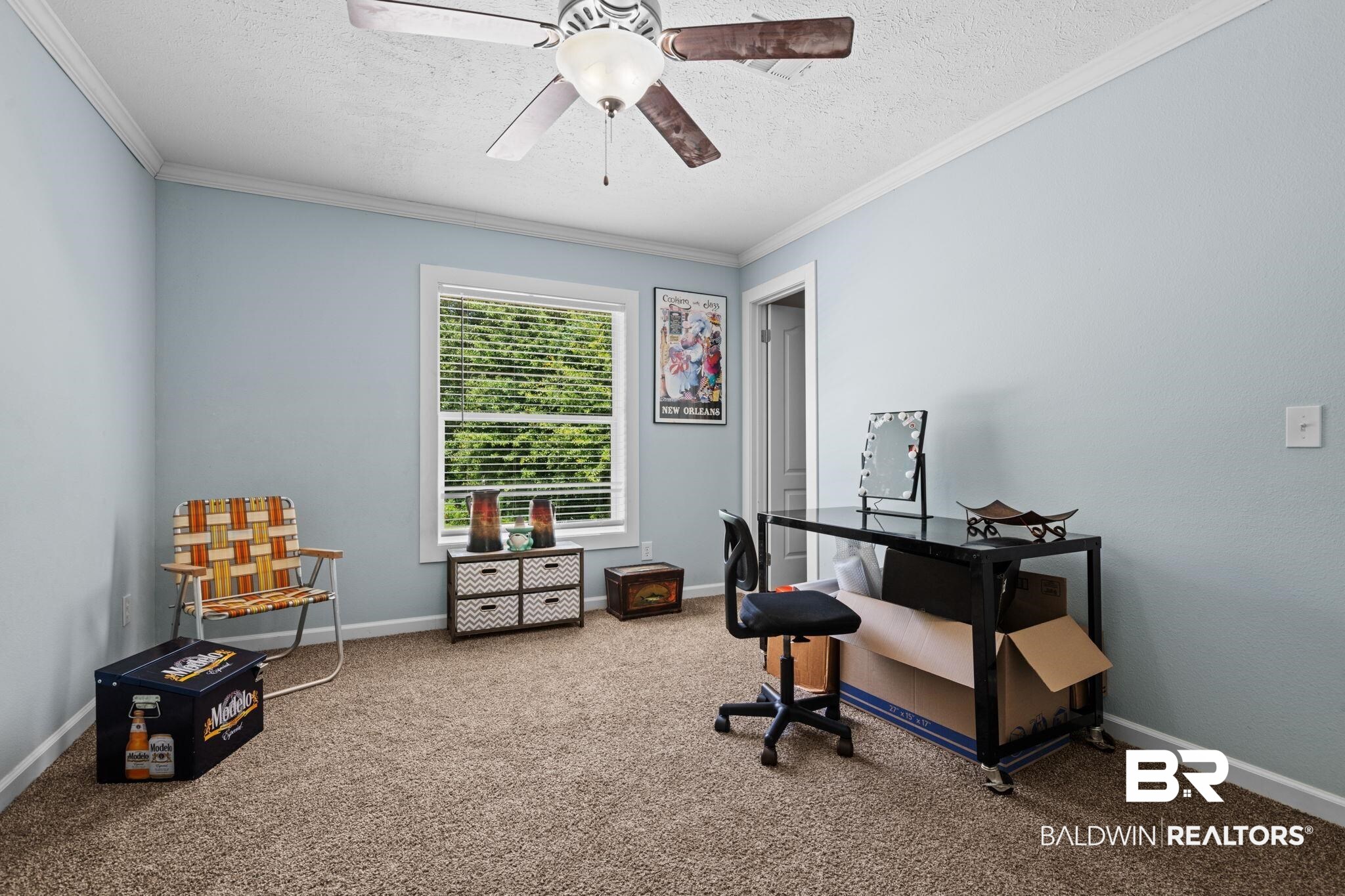 10703 South Ridge Drive Semmes, AL 36575 - Photo 30 of 37 Office area featuring a textured ceiling, carpet, crown molding, and ceiling fan